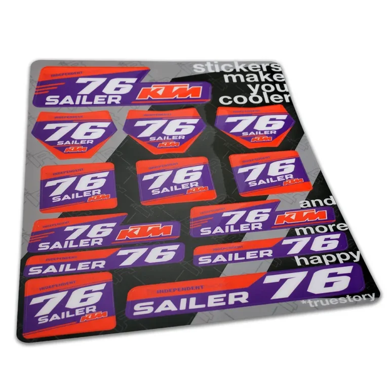 A purple and orange sticker sheet with the KTM logo, designed in a striking racing look with a high-gloss finish.