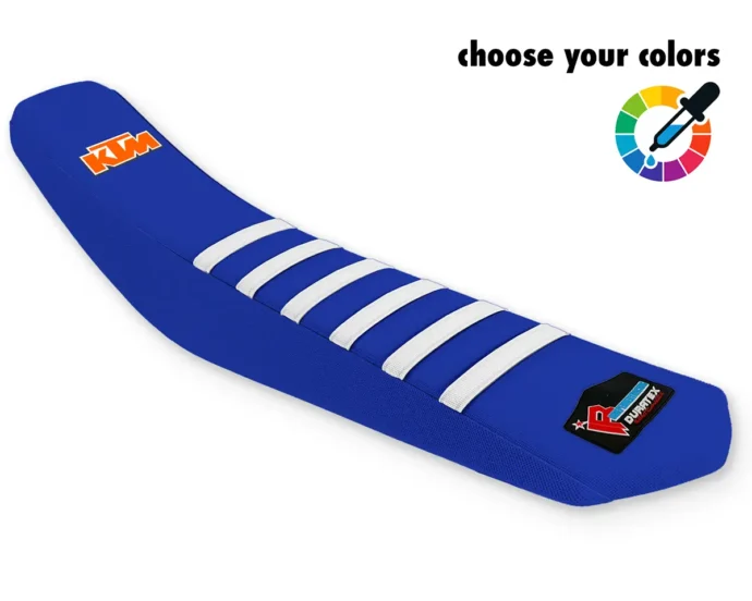 Blauer KTM Sitzbankbezug für Motocross, Enduro & Supermoto mit weißen Rippen und KTM-Logo.